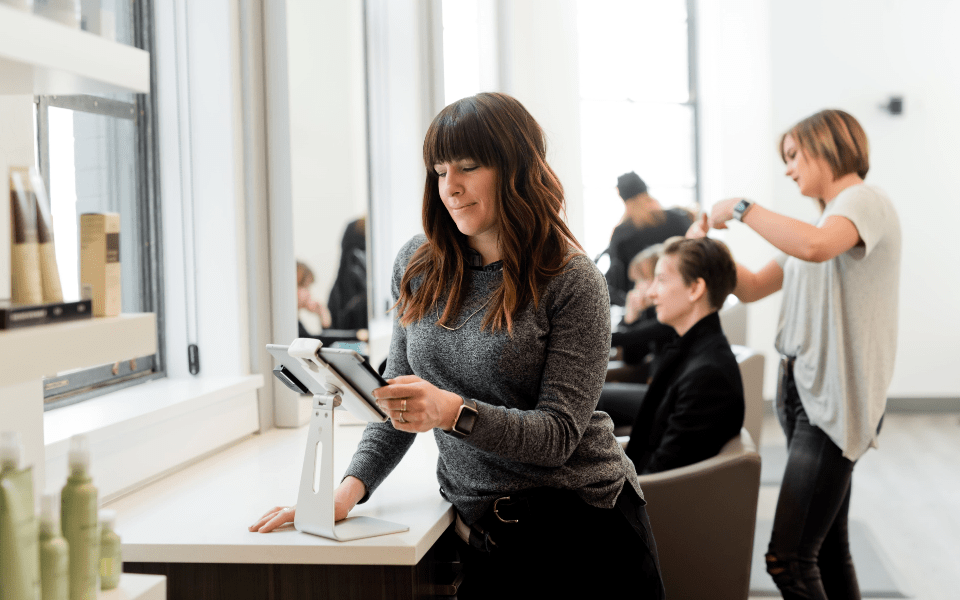 two-tone-woman holding phone